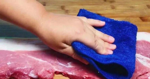 Why do butchers cover pork with cloth?