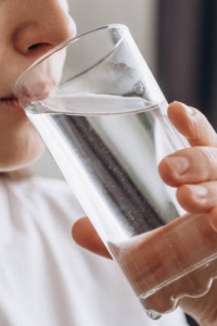 Why should you drink water on an empty stomach right after waking up?