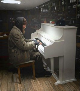 Someone Broke Into My Cafe at Night – I Thought It Was a Robber, but Was Speechless When He Walked to the Piano